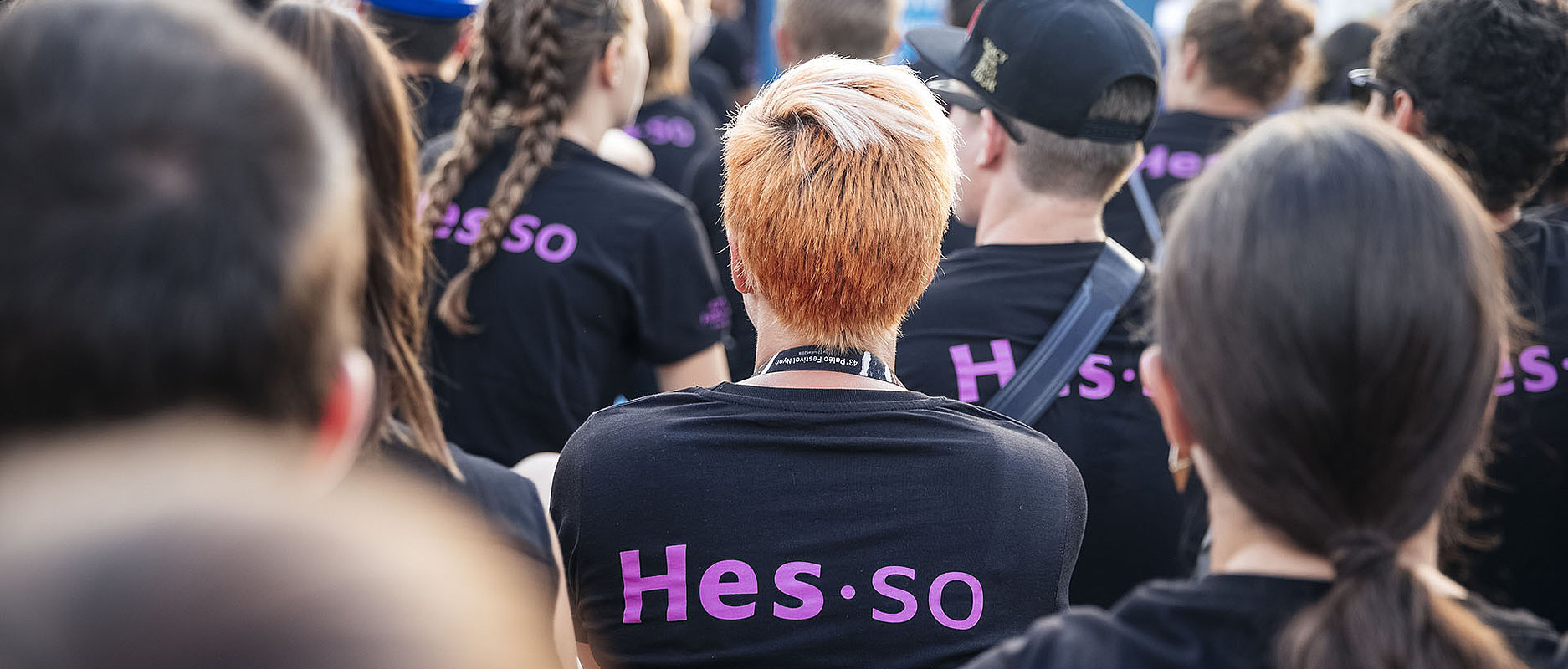 Etudiant-e-s avec logo HES-SO sur le t shirt au Paléo Festival